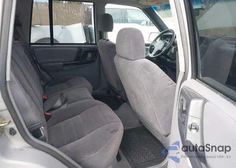 1998 Jeep Grand Cherokee Laredo z USA, uszkodzony, nr VIN 1J4GZ58S6WC277535